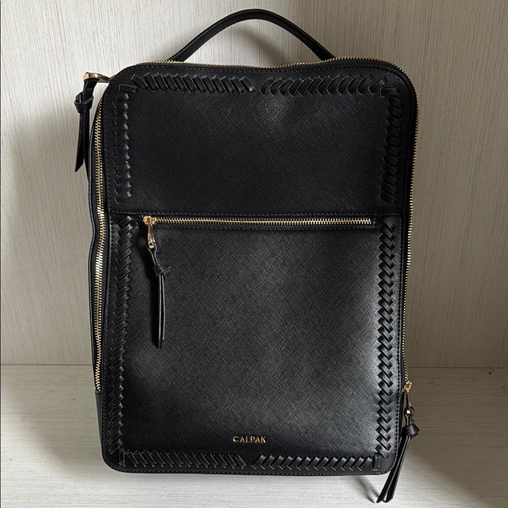 CALPAK Black Backpack—never used!